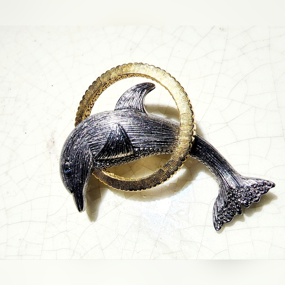 Vintage Liz Claiborne Silver brush dolphin w/sapphire jumping through gold hoop